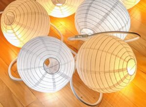 String of lights in paper lantern covers
